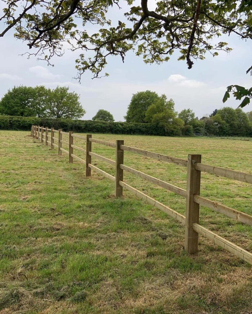 This is a photo of a post and rail fence installed in a field by Fast Fix Fencing Eaton