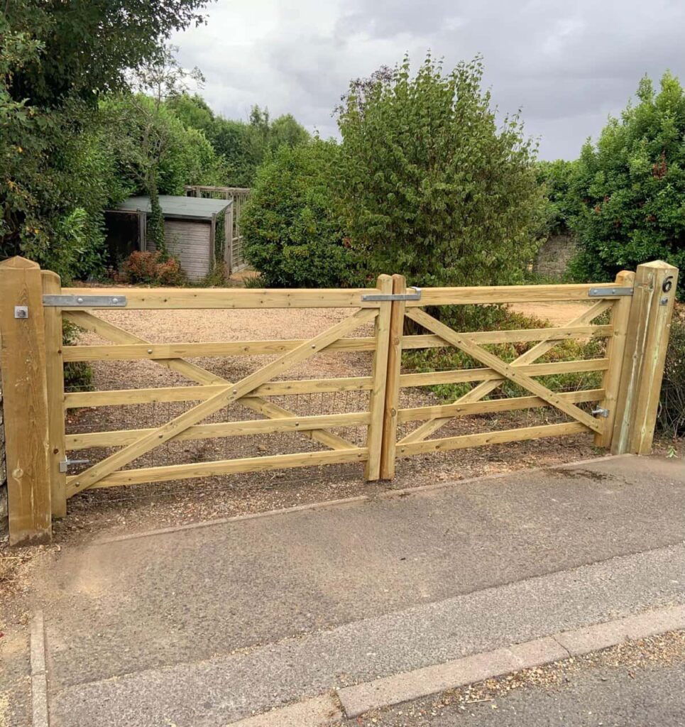 This is a photo of a wooden driveway gate installed by Fast Fix Fencing Eaton